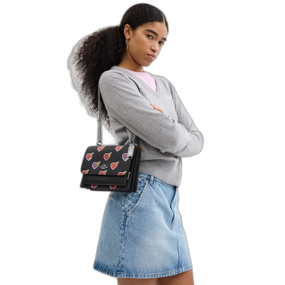 COACH | Klare Crossbody Bag With Heart Bolt Print